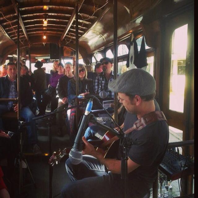 Luke Watt performing on The Blues Tram